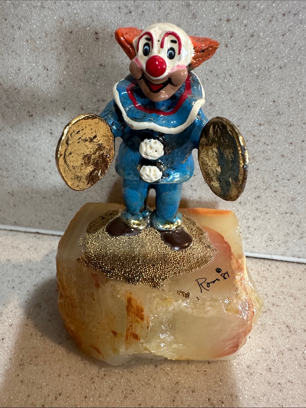 Ron Lee hand painted clown playing cymbals with gold accents on marble base 87